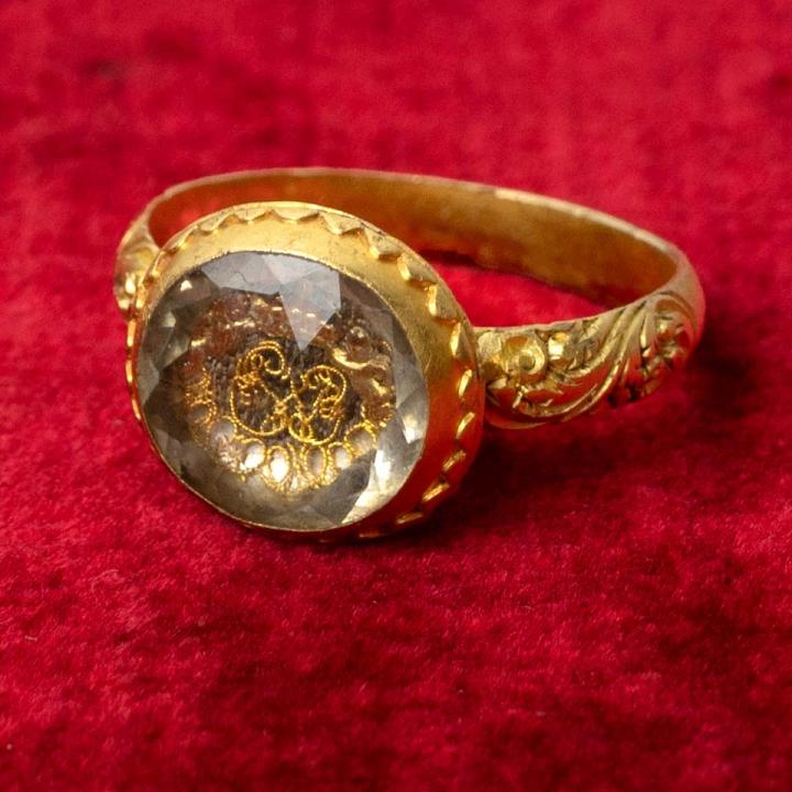 Post Mediaeval mourning ring on a red velvet background