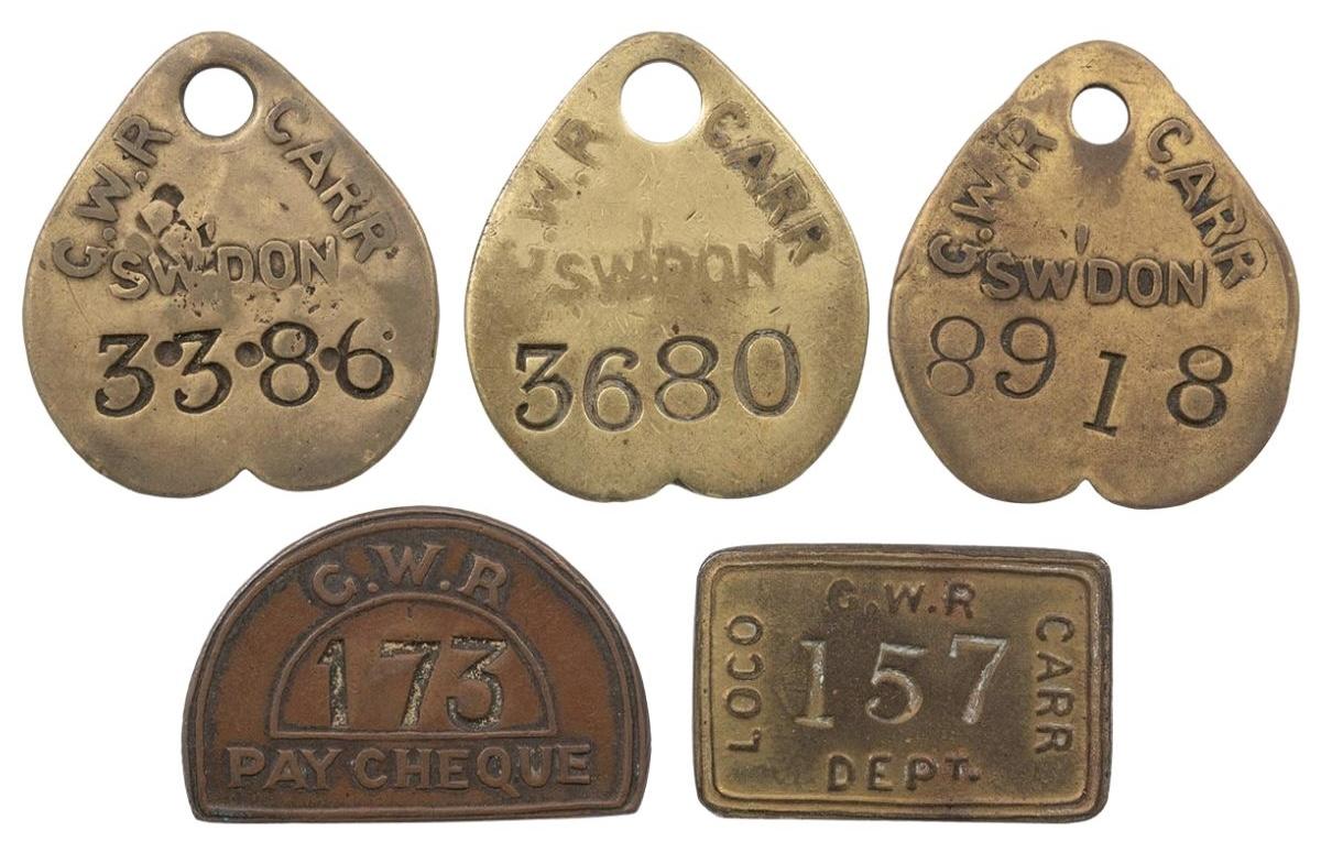 Aluminium bread tokens from the Co-Op, brightly coloured milk tokens from local dairies, and a clutch of GWR pay checks are reminders of Wiltshire life and industry in the recent past.